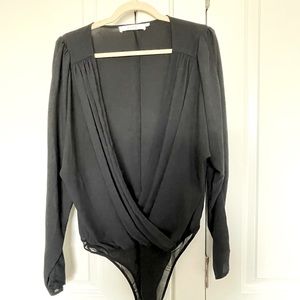 ASTR black bodysuit size xl never worn